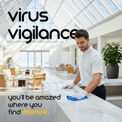 Man wiping down marble countertop in an airy house