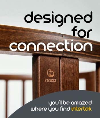 A closeup of a wooden infant bed